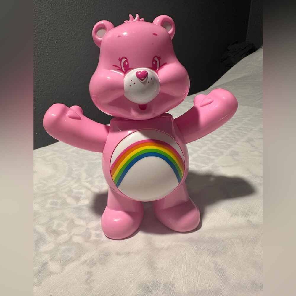 Care Bears light -up belly arms move up and down Toy with Rainbow Design .